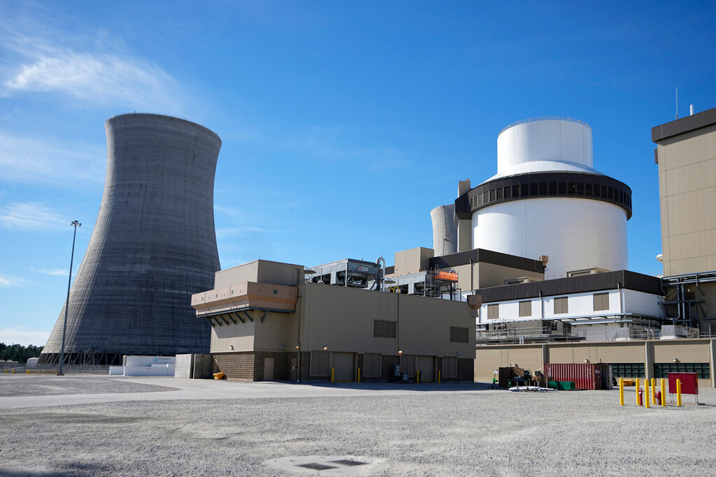 Unit 3’s reactor and cooling tower stand at Georgia Power Co.'s Plant Vogtle nuclear power plant on Jan. 20, 2023, in Waynesboro, Ga. Company officials announced Wednesday, May 24, 2023, that Unit 3, one of two new reactors at the site, would reach full power in coming days, after years of delays and billions in cost overruns. (AP Photo/John Bazemore, File)