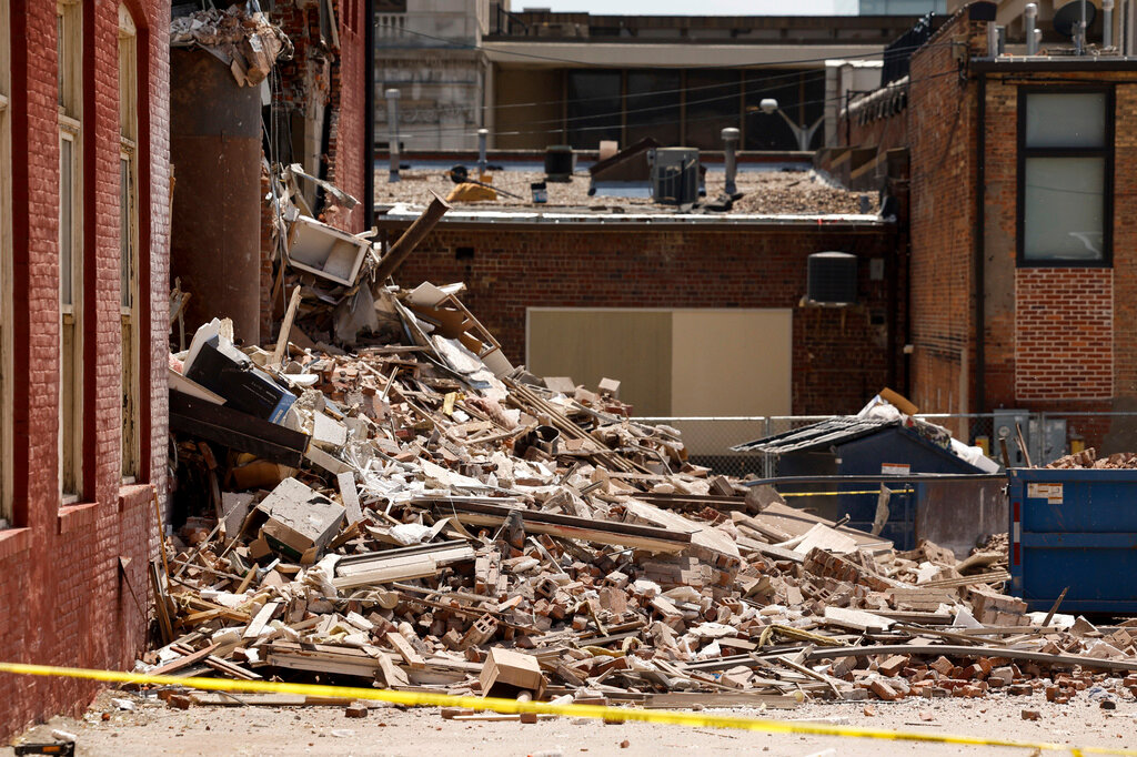 Rubble lies in a pile outside The Davenport on Main Street in Davenport, Iowa, on Monday, May 29, 2023. (Nikos Frazier/Quad City Times via AP)