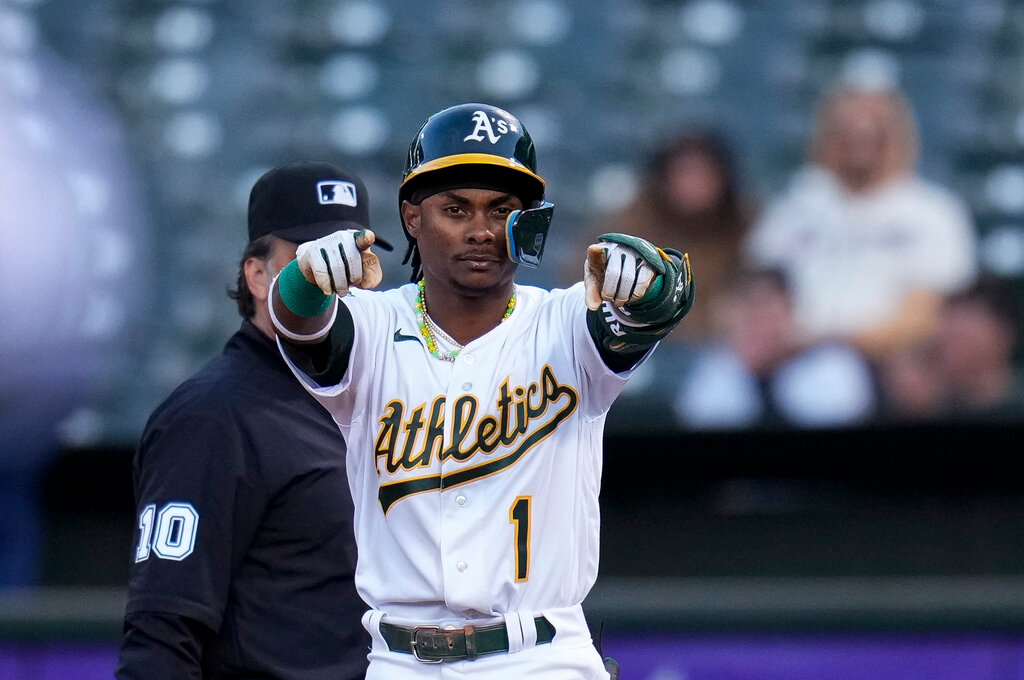 Oakland Athletics' Esteury Ruiz gestures after hitting an RBI single against the Atlanta Braves during the fifth inning in Oakland, Calif., Tuesday, May 30, 2023. (AP Photo/Godofredo A. Vásquez)