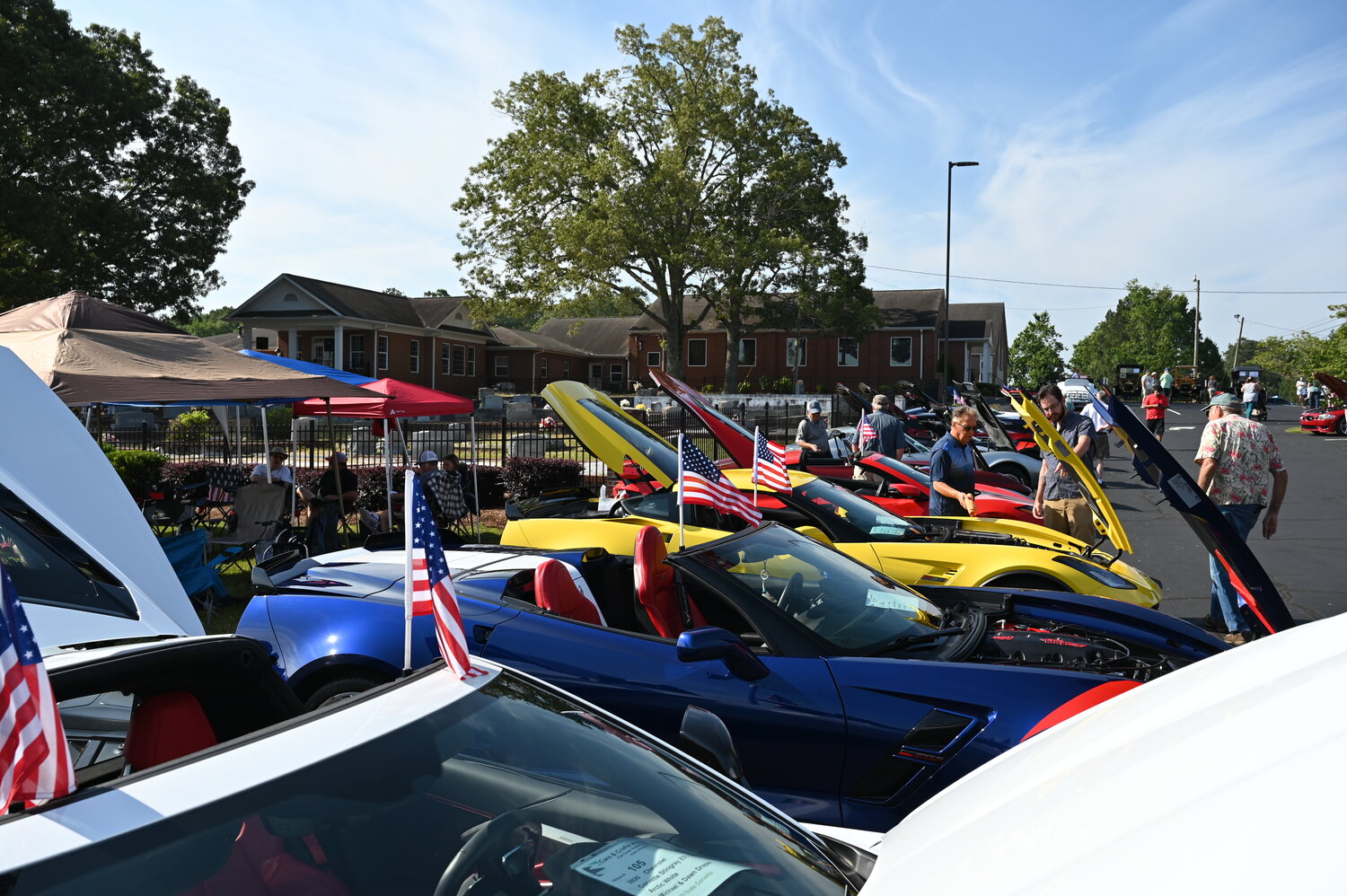 Corvettes are among the more than 100 cars on display at Flat Creek Baptist Church in Fayetteville, Ga. on Saturday, June 3, 2023. (Index/Roger Alford)