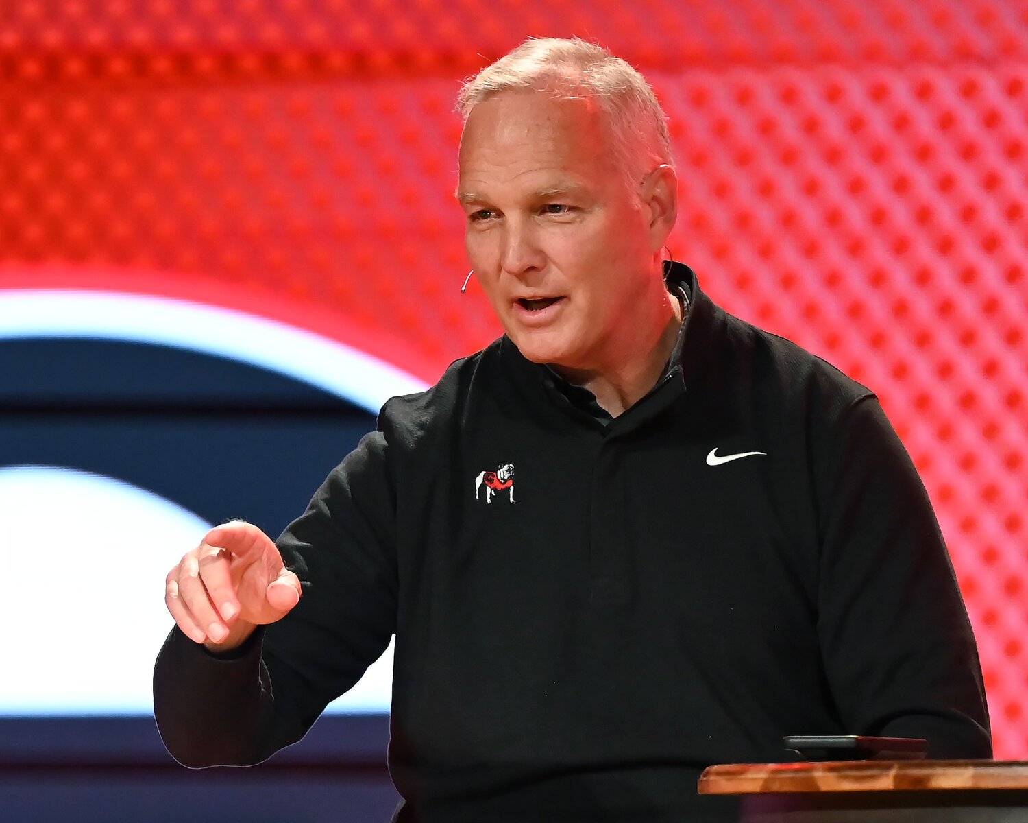 Former UGA football coach Mark Richt makes a point during the Fellowship of Christian Athletes UGA Night of Champions event on Friday at First Baptist Church of Woodstock. (Index/Henry Durand)