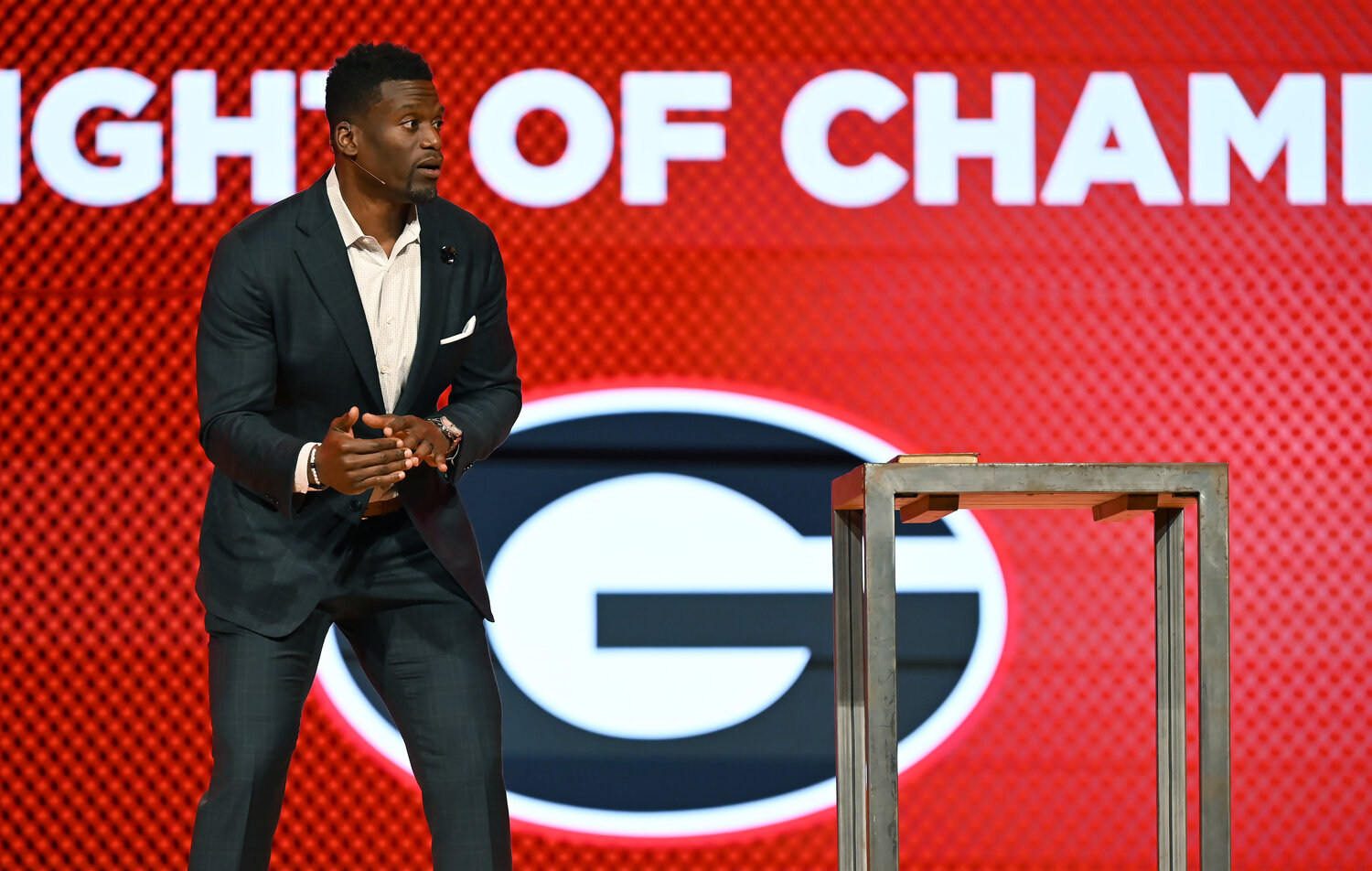 Ben Watson, former Georgia player and NFL tight end, speaks during the Fellowship of Christian Athletes UGA Night of Champions event on Friday at First Baptist Church of Woodstock. (Index/Henry Durand)