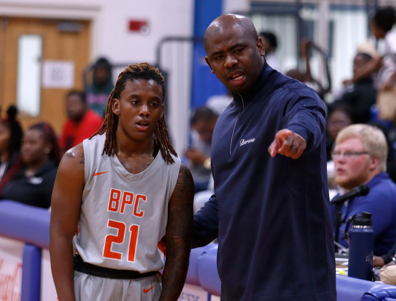 Brewton-Parker College women's basketball coach Steve Edwards gives instructions to Aaliyah Clay. (Photo/Brewton Parker College)