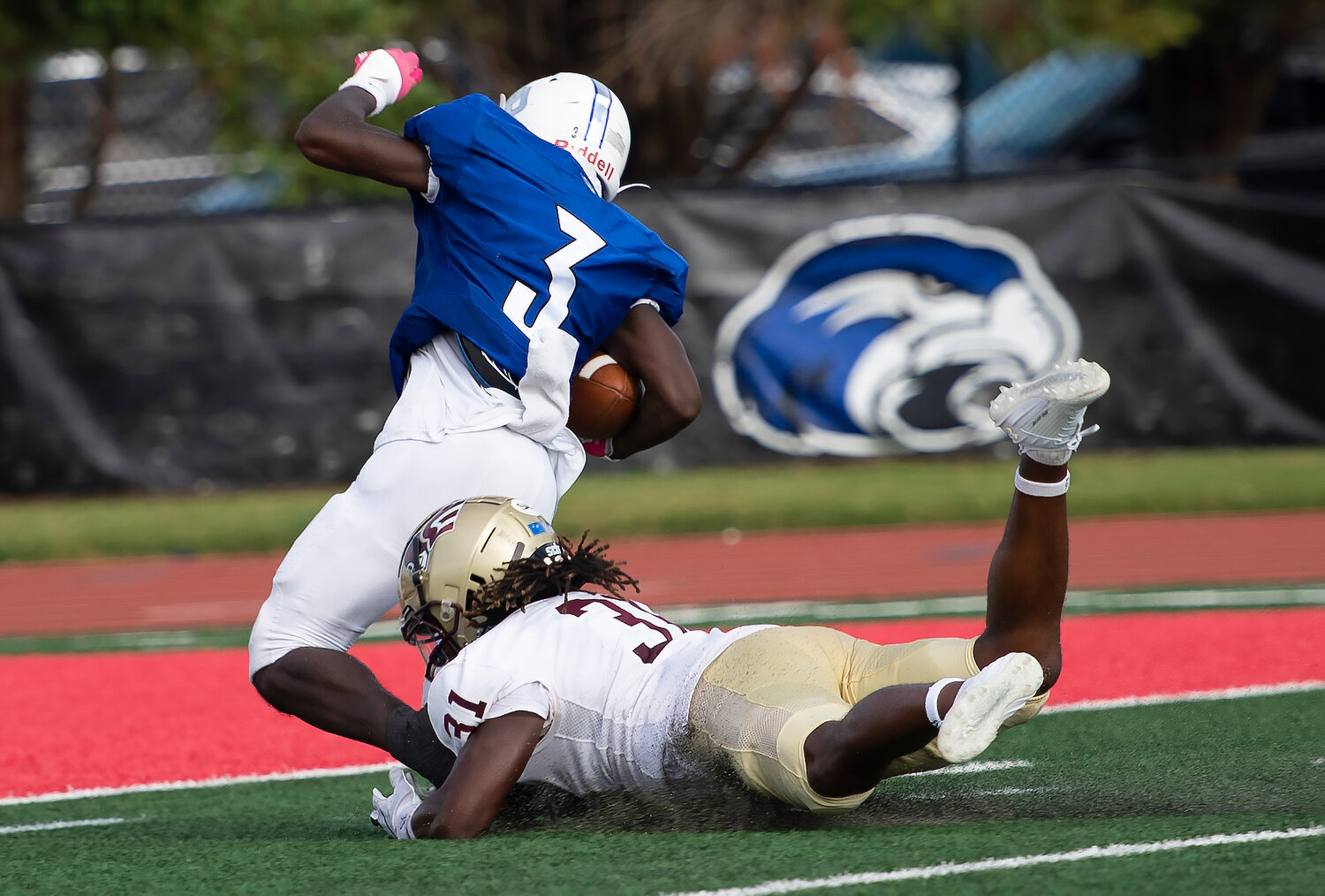 Erskine College defensive back Jakai Robinson (31) brings down Shorter University wide receiver Brando McGill on the 1-yard-line after a long reception in the third quarter Saturday, Sept. 9, 2023, in Rome, Ga. Shorter won 28-7. (Index/Henry Durand)