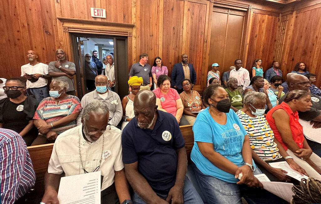 Residents, landowners and supporters of the Hogg Hummock community on Sapelo Island fill a courtroom in Darien, Ga., on Tuesday, Sept. 12, 2023. (AP Photo/Russ Bynum)