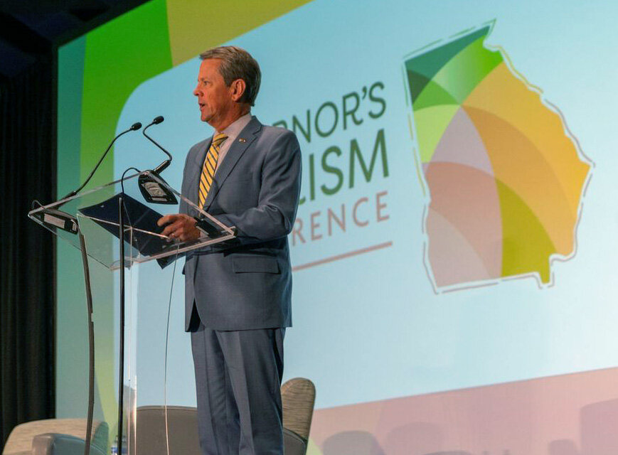Gov. Brian Kemp addresses the annual Georgia Governor’s Tourism Conference. (Photo/Capitol Beat News Service)