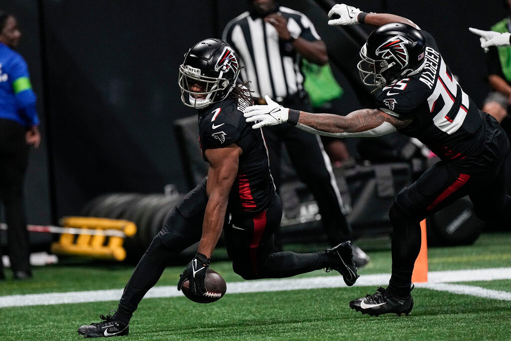 Atlanta Falcons running back Bijan Robinson (7) runs into the end zone for a touchdown against the Carolina Panthers, Sunday, Sept. 10, 2023, in Atlanta. (AP Photo/John Bazemore, File)