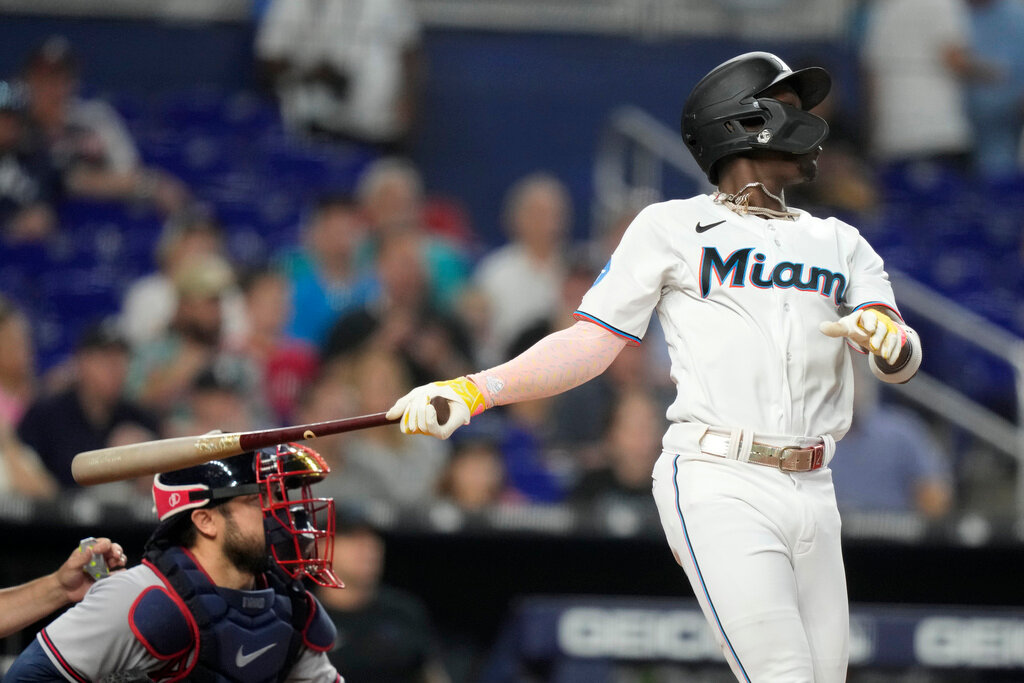 Miami Marlins' Jazz Chisholm Jr. watches after hitting a grand slam during the third inning against the Atlanta Braves, Sunday, Sept. 17, 2023, in Miami. (AP Photo/Lynne Sladky)