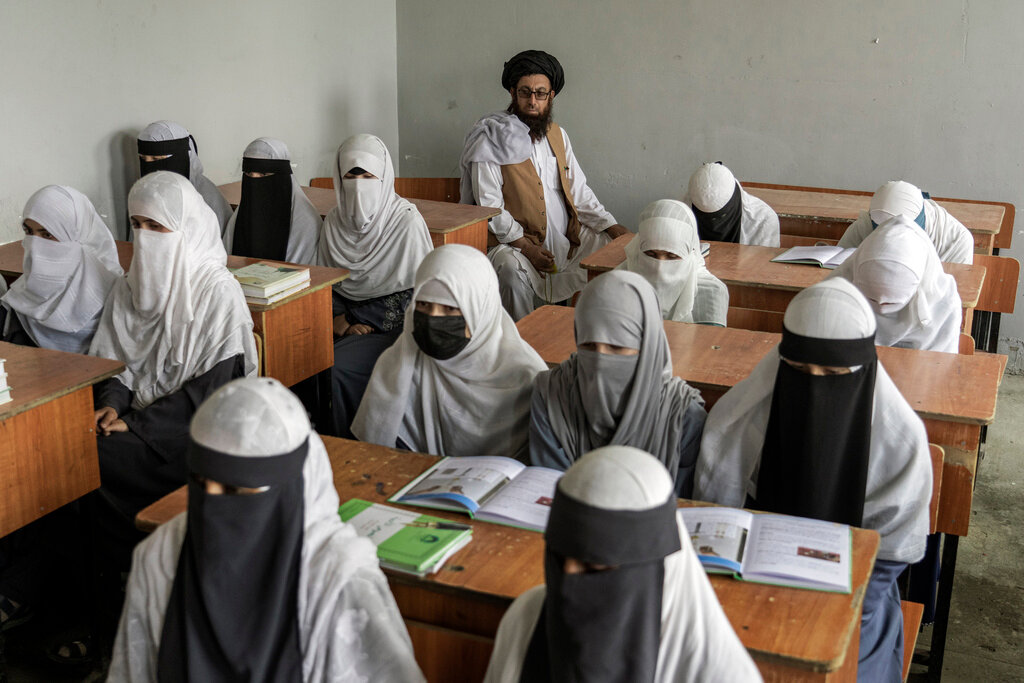 Afghan girls attend a religious school in Kabul, Afghanistan, on Aug. 11, 2022. (AP Photo/Ebrahim Noroozi, File)