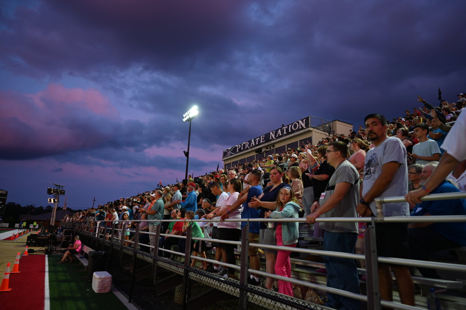 Crowds gather for a GO TELL Ministries evangelistic crusade at Jimmy Swain Stadium in Baxley, Ga. on Wednesday, Septebmer 20, 2023. (Index/Roger Alford)