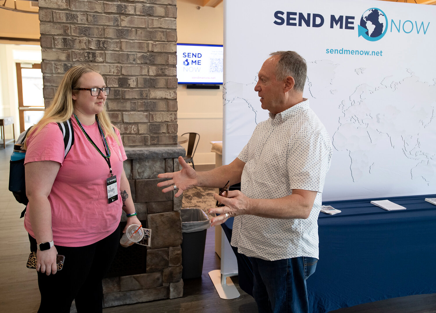 Warren Skinner with Send Me Now speaks to GCSU student Ashlynn Phillips during Confluence 2023 at Eagle's Landing First Baptist Church in McDonough, Ga., Saturday, Sept. 23, 2023. (Index/Henry Durand)