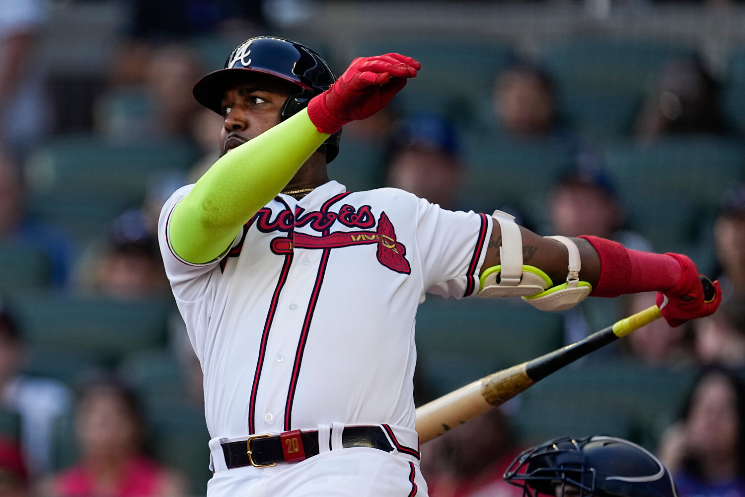 Atlanta Braves designated hitter Marcell Ozuna hits a solo home run in the ninth inning against the Washington Nationals, Sunday, Oct. 1, 2023, in Atlanta. (AP Photo/John Bazemore)