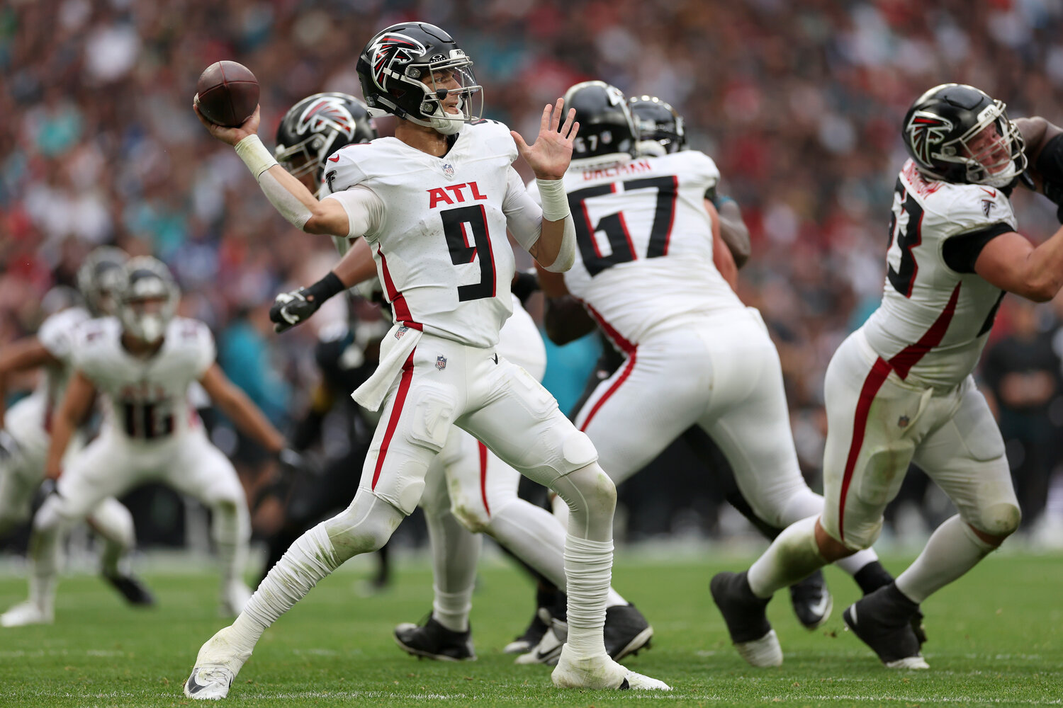 Atlanta Falcons quarterback Desmond Ridder (9) passes the ball against the Jacksonville Jaguars in London, Sunday, Oct. 1, 2023. (AP Photo/Ian Walton)