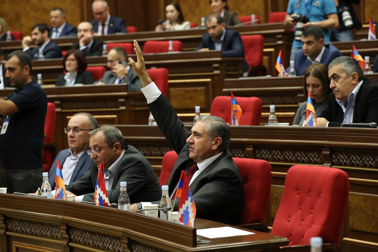 Armenian lawmakers attend the session of the National Assembly of the Republic of Armenia in Yerevan, Armenia, Tuesday, Oct. 3, 2023. (Hayk Baghdasaryan/PHOTOLURE via AP)
