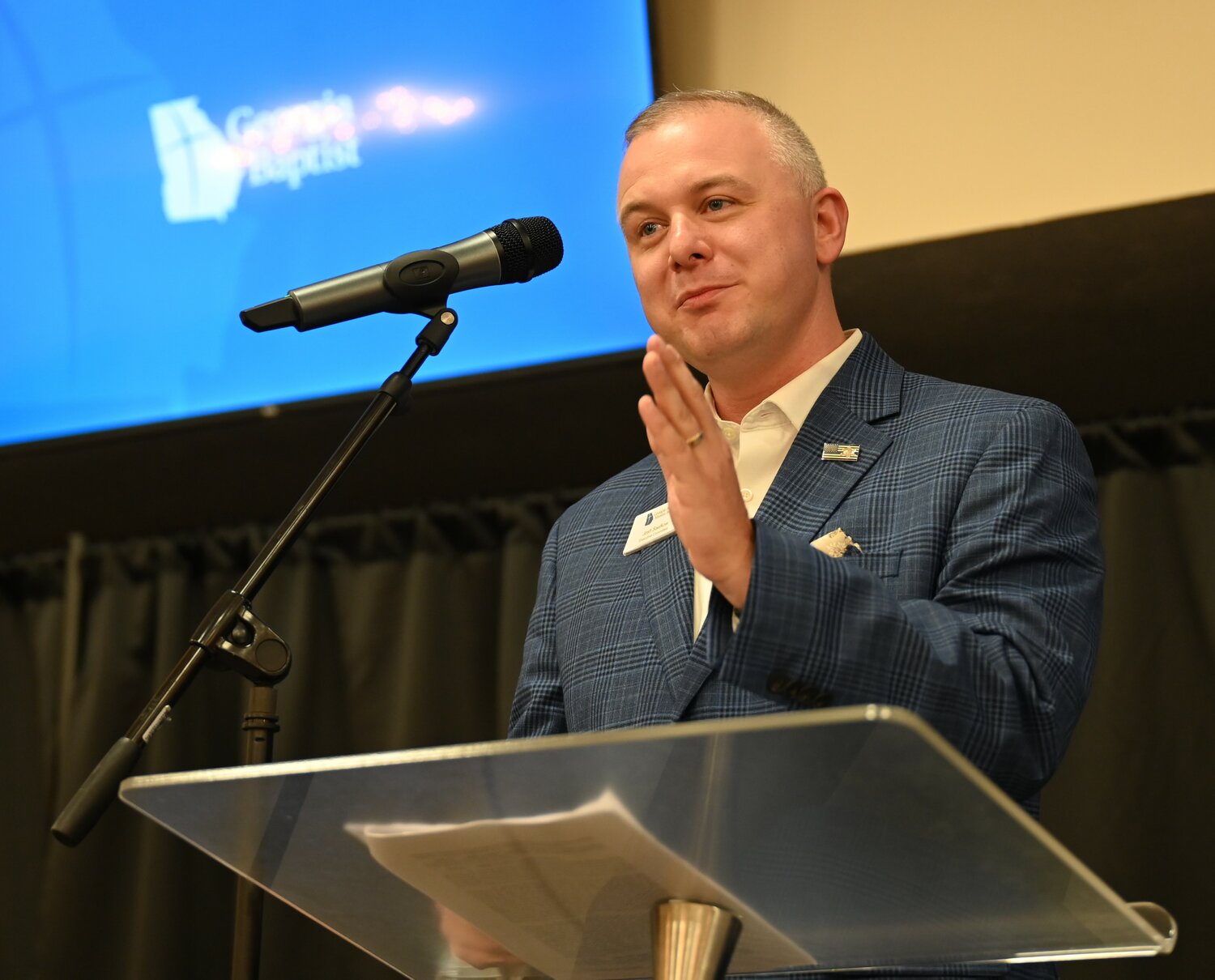 Josh Saefkow speaks to the Georgia Baptist Executive Committee in Fayetteville.