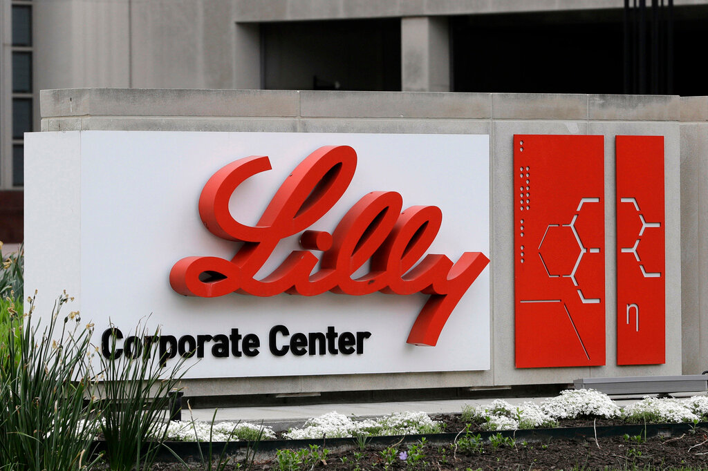 A sign for Eli Lilly & Co. stands outside their corporate headquarters in Indianapolis on April 26, 2017. (AP Photo/Darron Cummings, File)