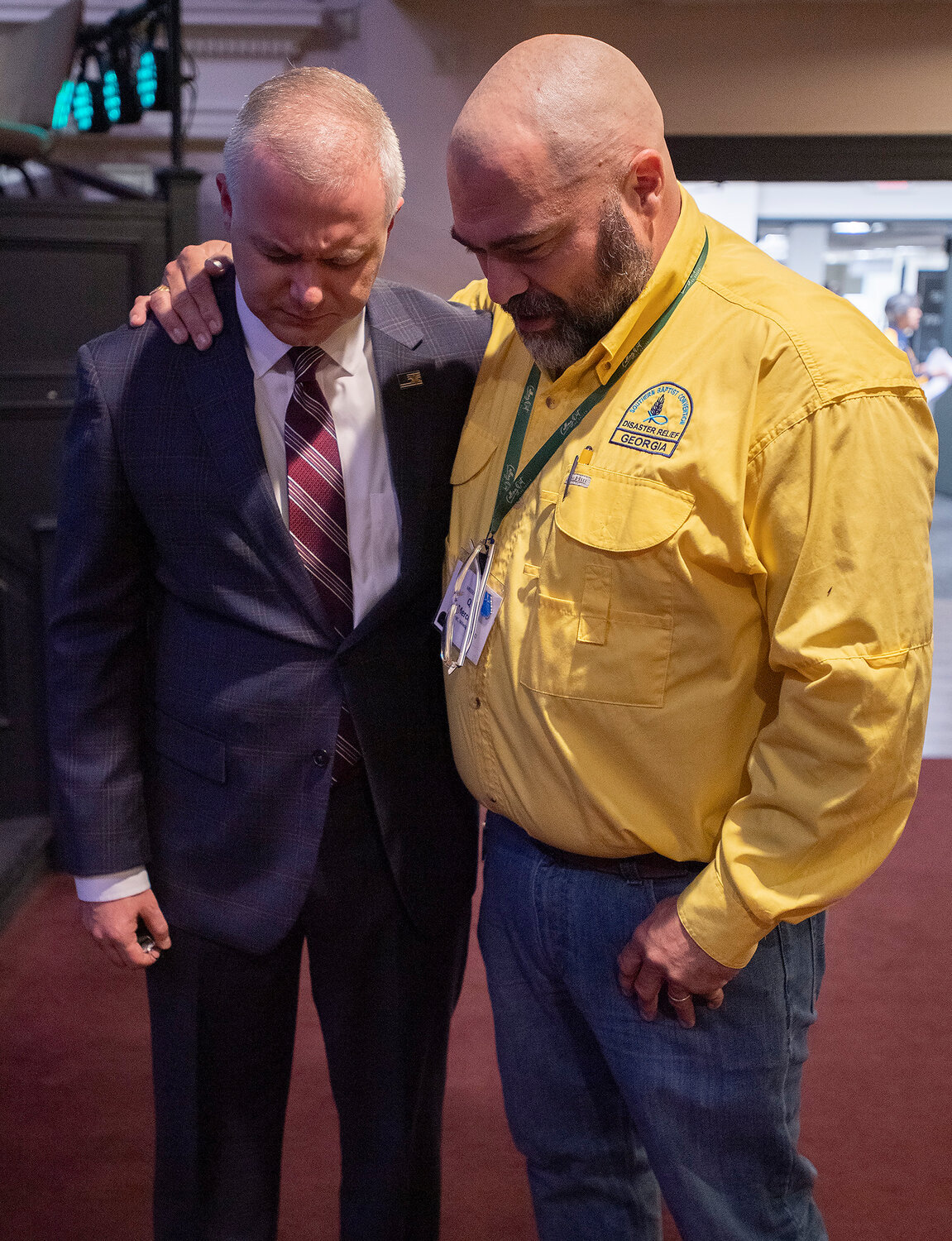 Q Mercer, right, associational mission strategist for the Washington Baptist Association, prays over Georgia Baptist Convention President Josh Saefkow during the third day of the Convention's 201st annual meeting Tuesday at Church on Main in Snellville, Ga. (Index/Henry Durand)