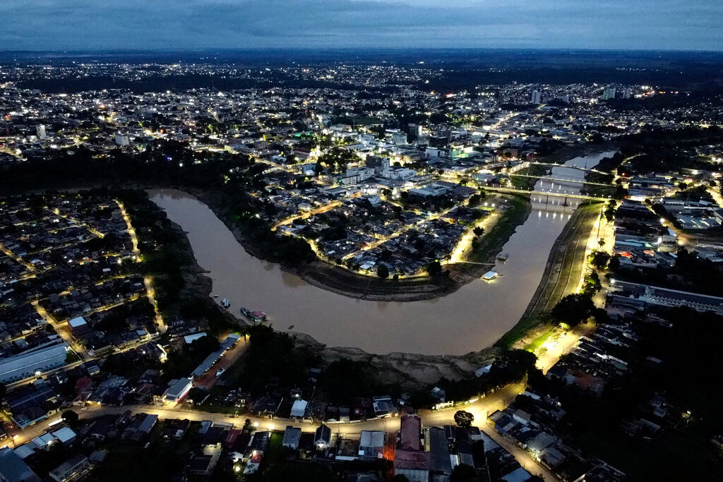 The Acre River winds through the city of Rio Branco, Acre state, Brazil, Wednesday, May 24, 2023. (AP Photo/Eraldo Peres)