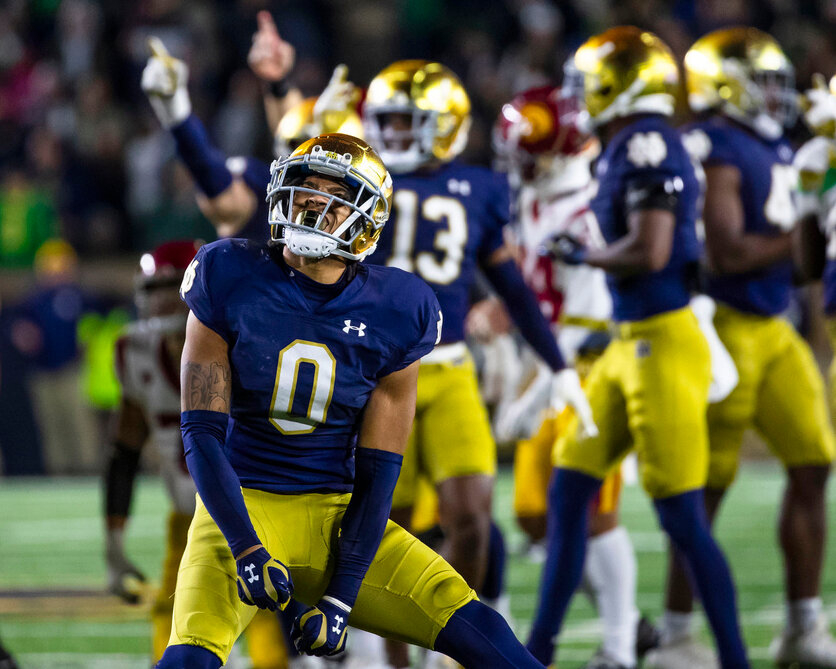 Notre Dame safety Xavier Watts (0) celebrates during the second half against Southern California, Oct. 14, 2023, in South Bend, Ind. (AP Photo/Michael Caterina, File)