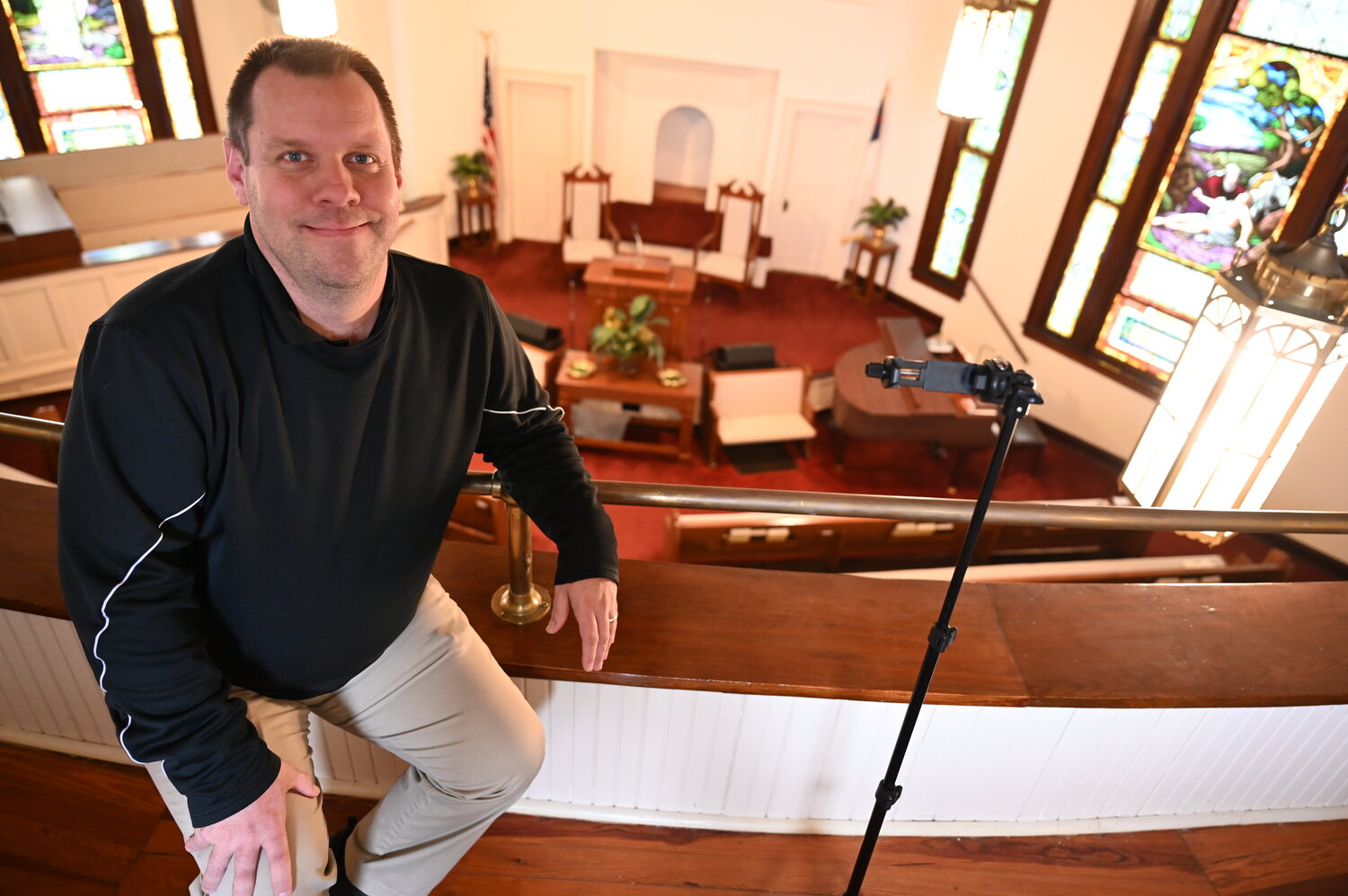 Pastor Dan Wright sits in the balcony at the historic Jeffersonville Baptist Church where he is leading revitalization efforts. (Index/Roger Alford)