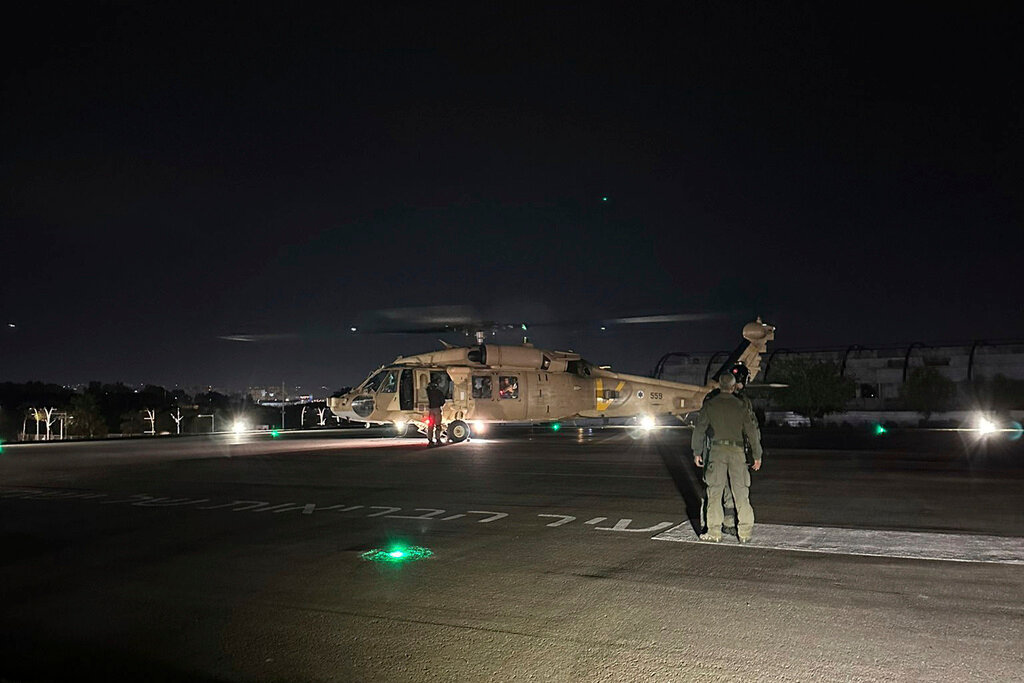 An Israeli Air Force helicopter carrying two released hostages at Sheba Medical Center in Ramat Gan, Israel, Monday, Feb, 12. 2024. (Israel Defense Forces via AP)