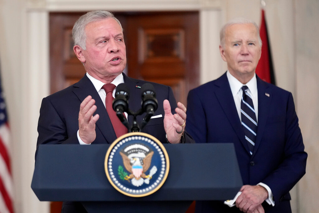 Jordan's King Abdullah II speaks as President Joe Biden listens at the White House, Monday, Feb. 12, 2024, in Washington. (AP Photo/Andrew Harnik)
