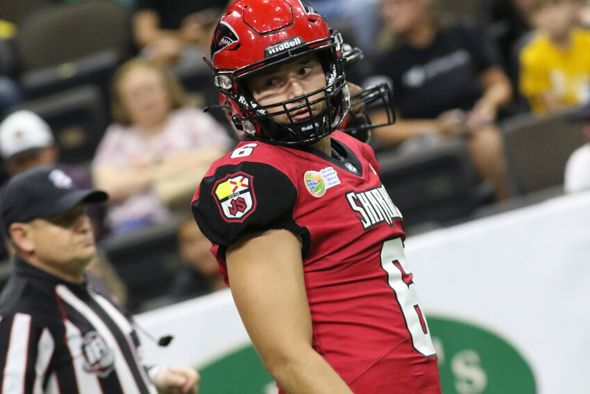 Jacksonville Sharks quarterback Tyler Huff scored off three first half touchdowns, but Sharks lost to division rival Green Bay Blizzard 75-43 with a key division game with Quad City Steamrollers this Saturday.
