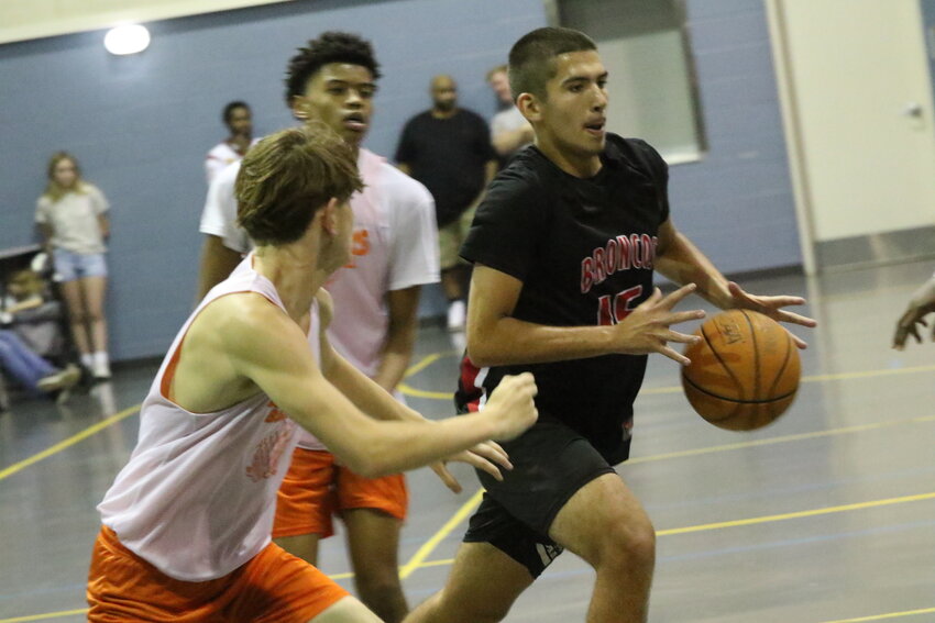 Middleburg High got a shot at Orange Park in a game that got a little feisty on the backboard despite games being summer league contests.