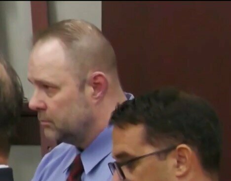 Corey Louis Binderim listens as the jury announces he was guilty of first-degree murder.