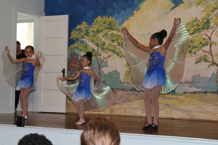 The evening was filled with upbeat tunes, sparkly costumes, light twirls and aerials, as dancers of various ages took to the stage at the Village Improvement Association.