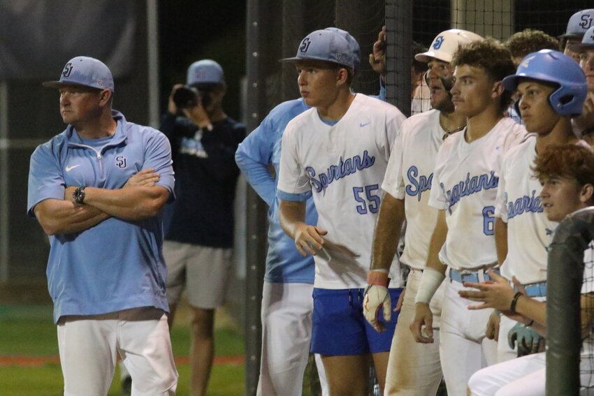 St.Johns Country Day School coach Tom Lucas, far left, has been through a fair share of tight playoff thrillers and will be tasked to bring home a second state title.