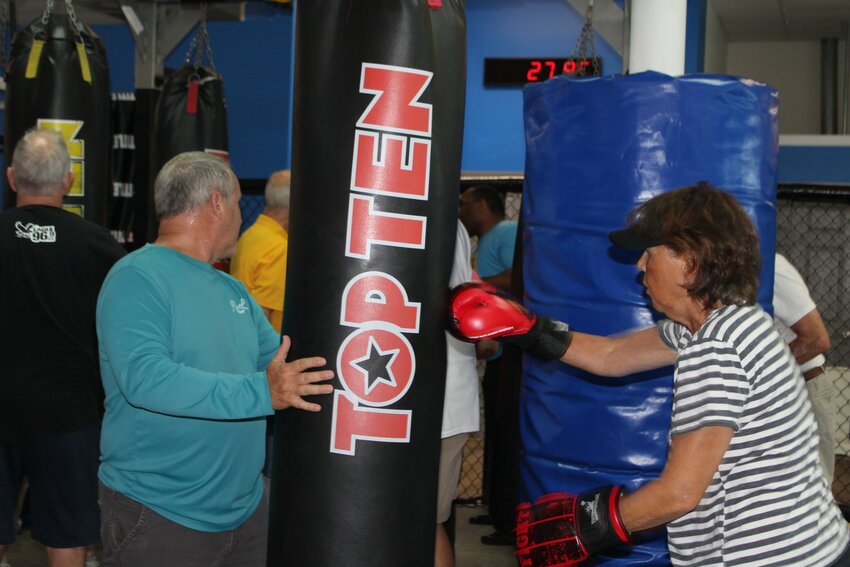 Boxing is known to help those with Parkinson's disease gain increased strength, improved posture and balance.