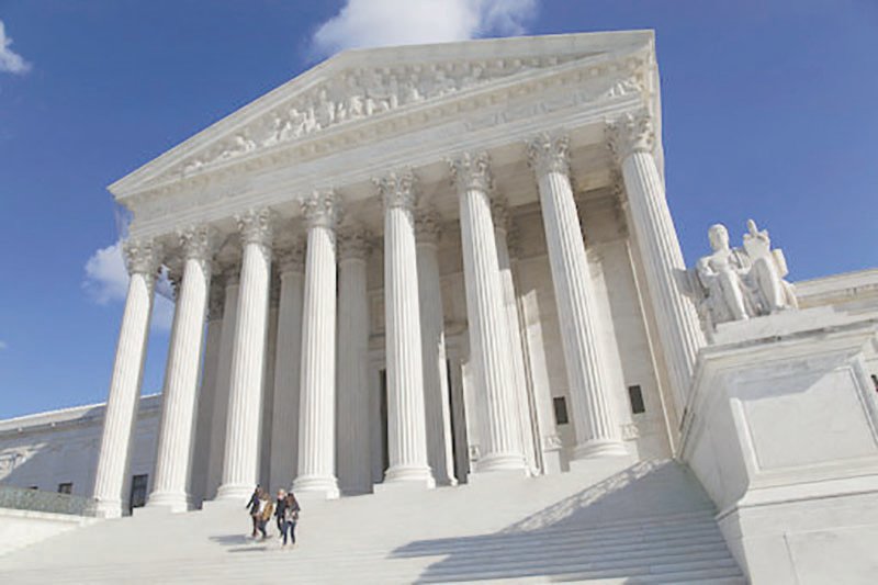 The front facade of the Supreme Court, Washington DC, USA.