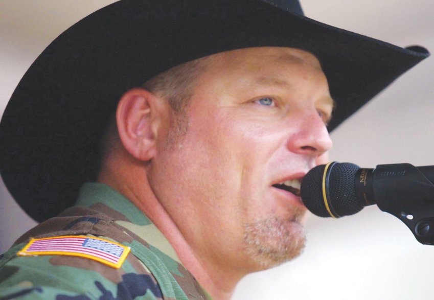 Country music singer John Michael Montgomery gives an emotional rendition of his latest hit, &quot;Letters From Home,&quot; during a concert in the Pentagon courtyard.