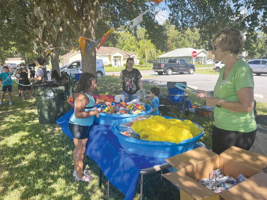 What would Fun in the Sun be without treats? Children were given snacks and gifts from the Village Improvement Association, Citizen&rsquo;s Advisory Board and Augusta Savage Arts and Community Center.