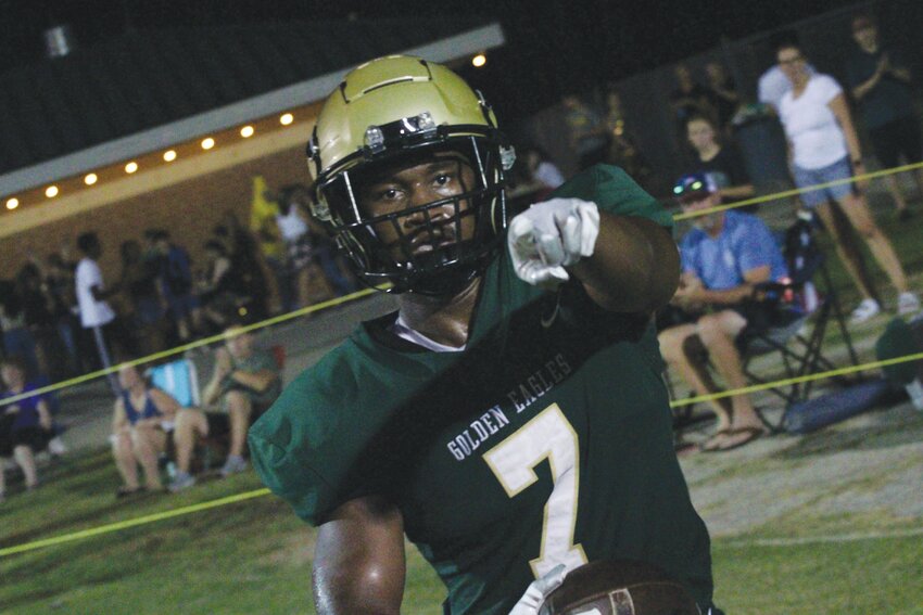 Fleming Island running back Dehmir Jackson scored late in the second half to lead the Golden Eagles to a 40-20 win over rival Clay High.