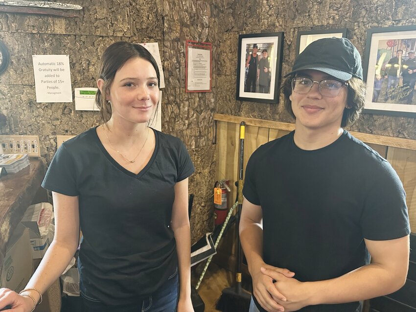 Clay High&rsquo;s Bailey Allbritton and Ridgeview&rsquo;s Dominick Ostrom, both 16, work as hosts at Dalton&rsquo;s Sports Grill in Lake Asbury. Both are old enough to continue their schedules as long as their duties don&rsquo;t hazardous responsibilities.