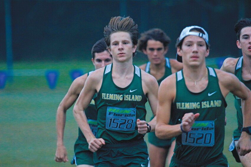 Fleming Island High cross country is led by the duo of Graham Myers, left, and John Keester IV who both hit for sub-16 minute races at the Florida Horse Park Invitational in Ocala.