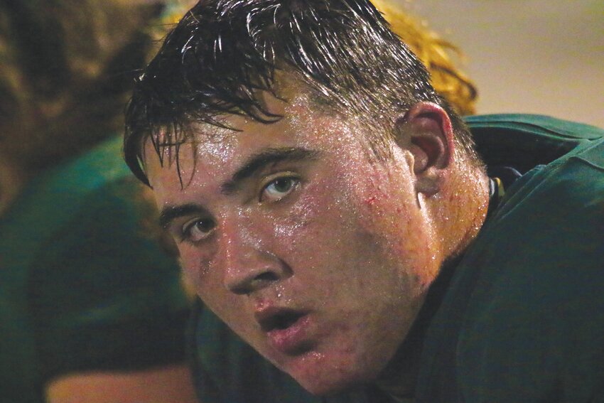 Fleming Island offensive tackle Braden Cunningham is a picture of near exhaustion after having to play offense and defense for the Golden Eagles in an exciting 49-28 district loss Friday night.