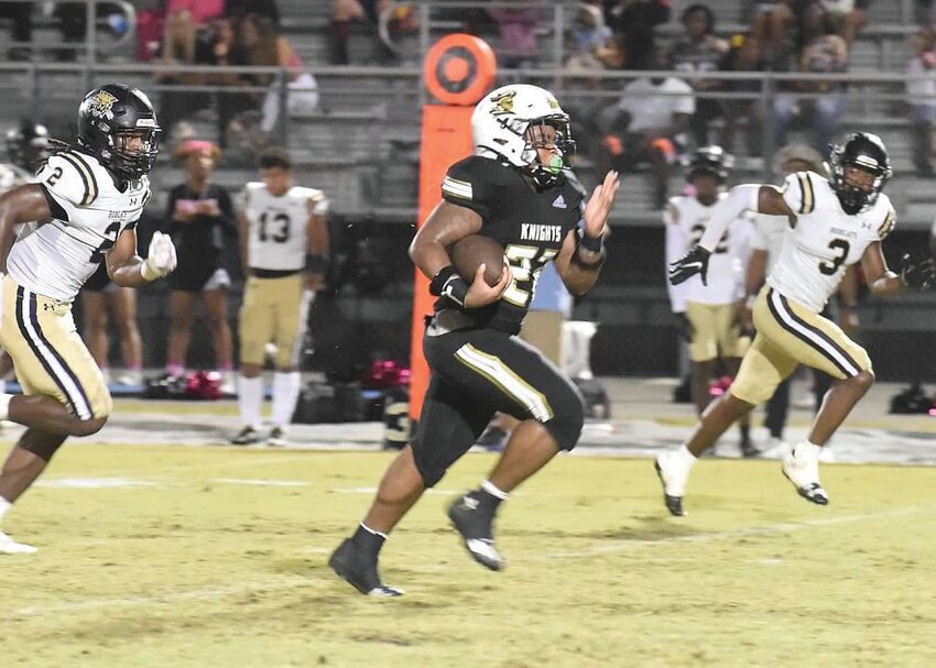 Oakleaf High running back Chris Foy II breaks for 40 40-yard scamper that got to the end zone but returned to the field for a penalty flag.