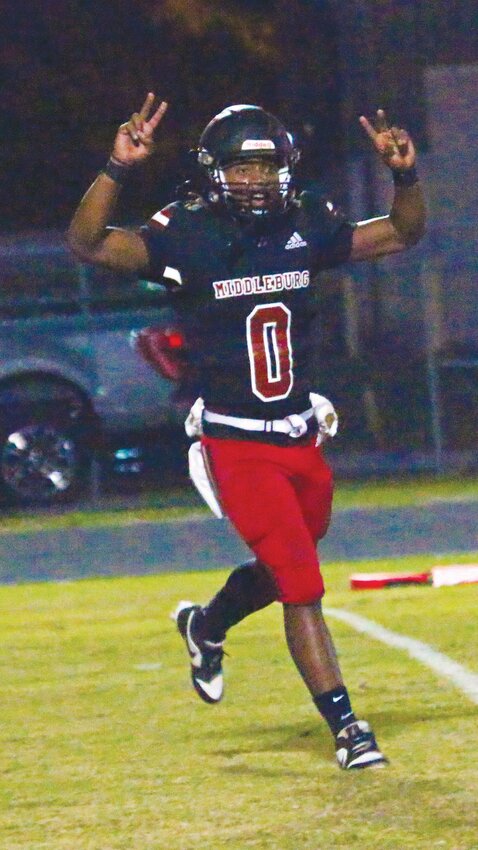 Middleburg High quarterback Jaydan Jenkins indicates &quot;two&quot; after scoring the second touchdown of first half in Broncos' 31-28 win over Bishop Kenny of Friday. Jenkins ran for 204 yards, had two scores and threw a touchdown pass in the fourth quarter to set up a game-winning field goal by Kaleb Robison.