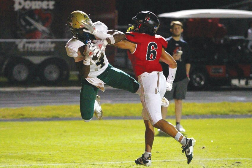 Fleming Island wide receiver Devean Boykin goes acrobatic for one of his many spectacular catches for scores.