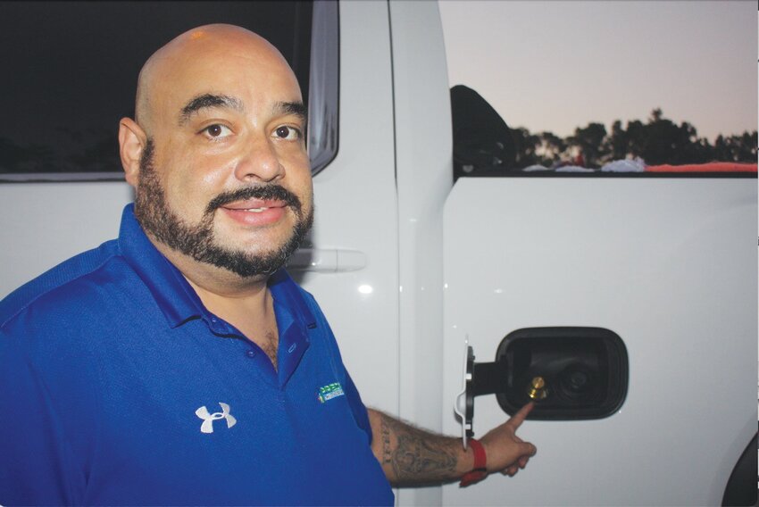 Ronny Martinez, owner of Precise Alternative Fuel Solutions in Green Cove Springs, demonstrates propane fuel innovation for a sustainable future.