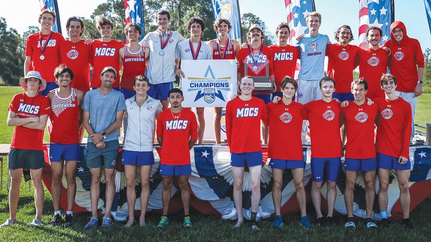 Former Keystone Heights High cross country standout Alex Guy, sixth from right, was a key runner for the Florida Southern College Sunshine State Athletic Conference team title. Guy is a fifth-year graduate student runner.