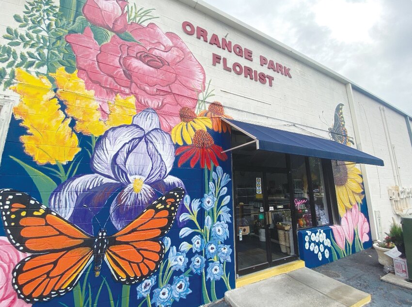 Longtime shop owner Carol Berg and her employees have been planning for the mural for more than two years.
