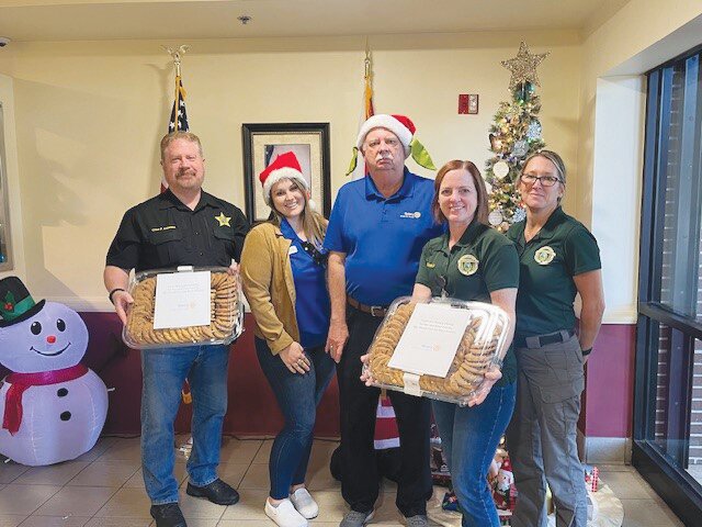 The Rotary Club of Orange Park Sunrise recently donated 18 trays of cookies to several organizations, including The Navy-Marine Corp Relief Society at NAS JAX, USO Greater JAX, Clay County Fire and Rescue, Clay County Sheriff Department and 911 Emergency Team in Green Cove Springs, Florida Army National Guard Recruiting Office in Orange Park, Orange Park Police Department, First Coast Women Services, Quigley House, Waste Not Want Not, and Clay County Rescue Mission.
