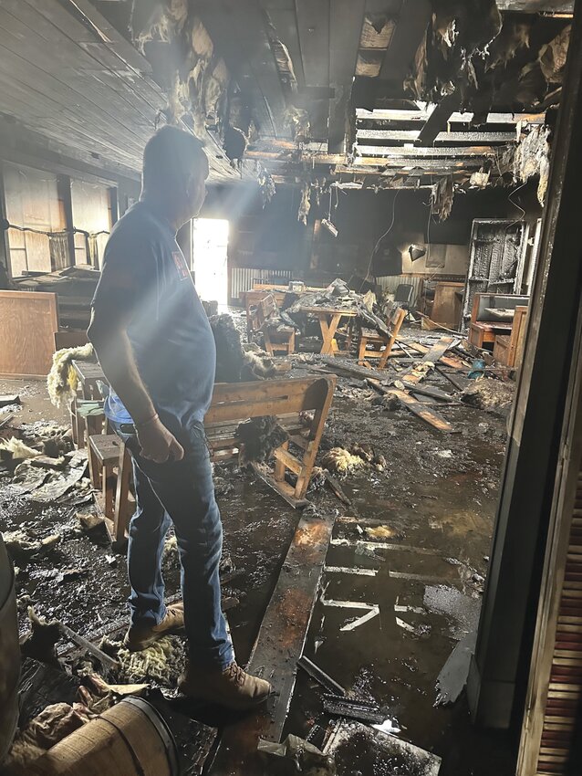 G&rsquo;s Slow Smoked BBQ owner Gary Park examined the damage after a fire destroyed the popular restaurant early last Tuesday.