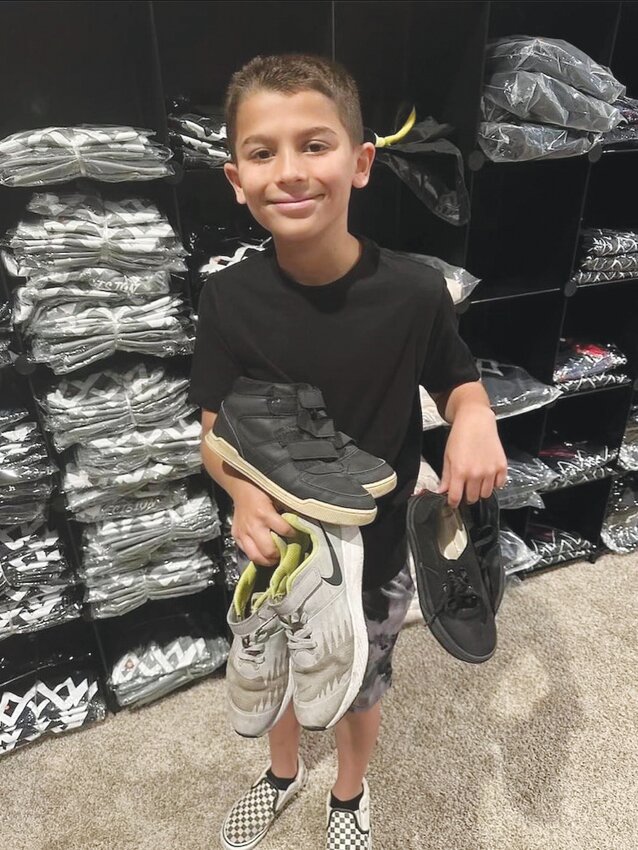 Lukas donated three pairs of lightly used sneakers to Carrasco&rsquo;s Got Sneakers.