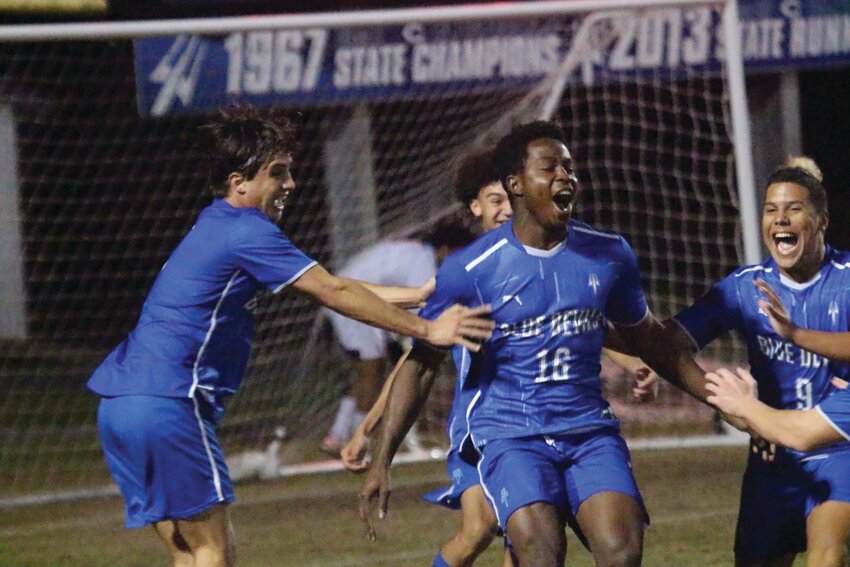 Clay High senior Jerry Alcindor, No. 16, got the first goal to ignite a 4-0 district semifinal win over Columbia to put the Blue Devils into their first district championship game in a decade.