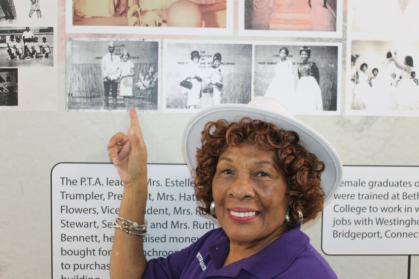 Henrietta Francis points to a photograph of herself when she was Ms. Dunbar.